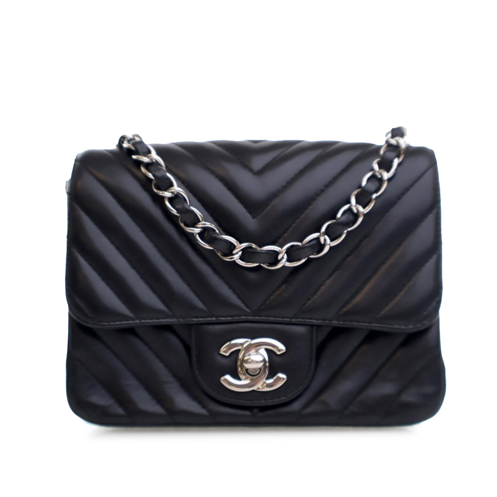 Chanel Mini Square Classic Chevron Flap Black Lambskin Bag: Chanel Mini Square Classic Chevron Flap Black Lambskin Bag This Chanel Mini Square Classic Chevron Lambskin Single Flap bag is a timeless accessory crafted from luxurious quilted leather. It features