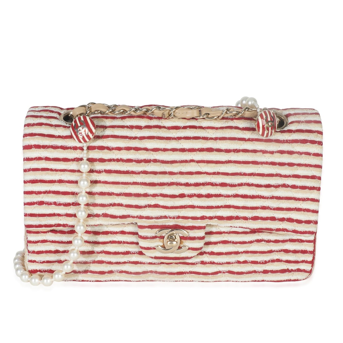 Medium Coco Sailor Flap Shoulder Bag by Chanel in Red and White Jersey: Medium Coco Sailor Flap Shoulder Bag by Chanel in Red and White Jersey This Chanel Medium Coco Sailor Flap Bag features a red, white, and tan quilted jersey exterior with gold-tone hardware. The shoul