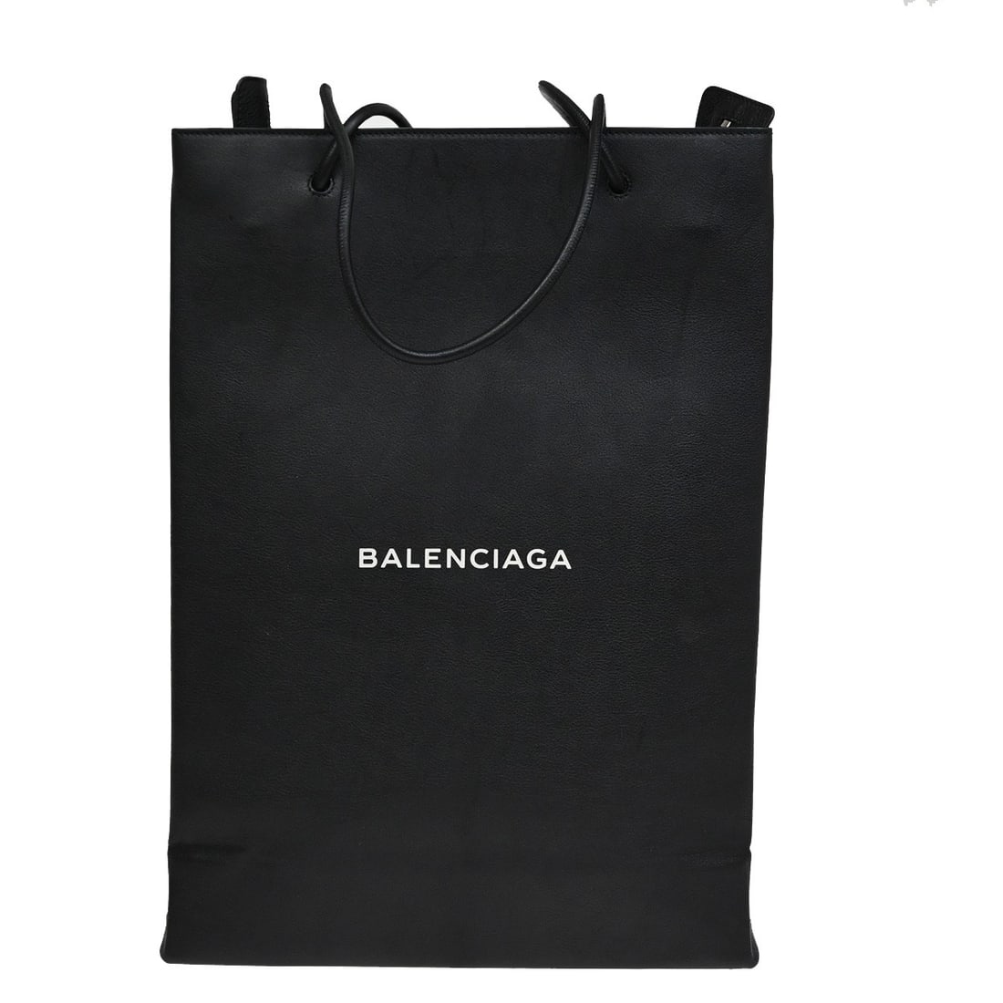 Black Tool 2.0 North South Tote by Balenciaga: Black Tool 2.0 North South Tote by Balenciaga This is a Balenciaga Tool 2.0 North South Tote in black, designed for women. The tote features a spacious interior and a sleek exterior. It shows minor si