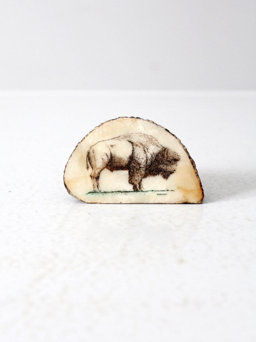 Vintage Bison Artwork on Faux Rock 3.75in: Vintage Bison Artwork on Faux Rock 3.75in This vintage Bison painting is crafted on faux rock, capturing the majestic presence of the bison in a unique medium. The artwork is in good condition, showca