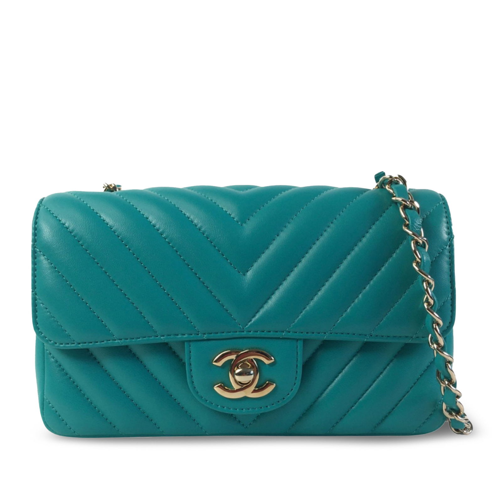 Chanel Mini Rectangular Chevron Green Lambskin Flap Bag: Chanel Mini Rectangular Chevron Green Lambskin Flap Bag This Chanel Mini Rectangular Chevron crossbody bag is crafted from luxurious quilted lambskin leather, showcasing a stylish green hue. The desig