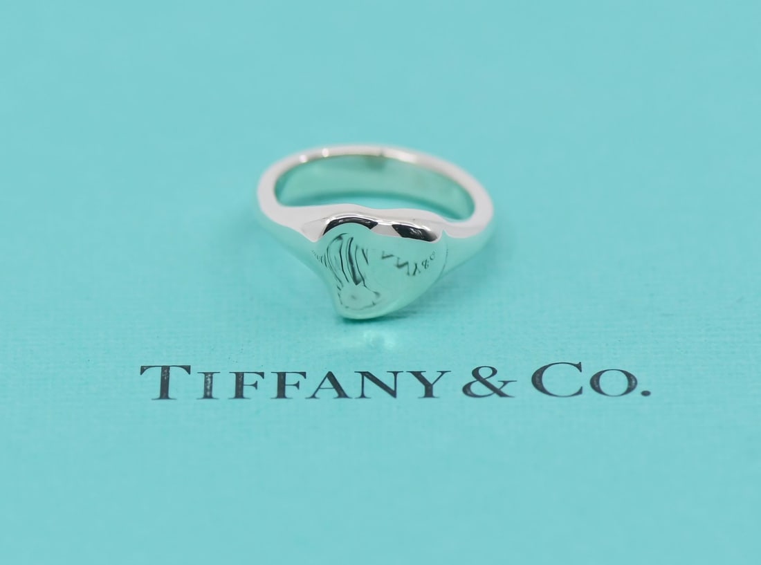 Elsa Peretti Sterling Silver Ring by Tiffany Size 5.5: Elsa Peretti Sterling Silver Ring by Tiffany Size 5.5 This Tiffany & Co. Elsa Peretti ring is crafted from sterling silver and features a minimalist design without a main stone. The ring is a size 5.5