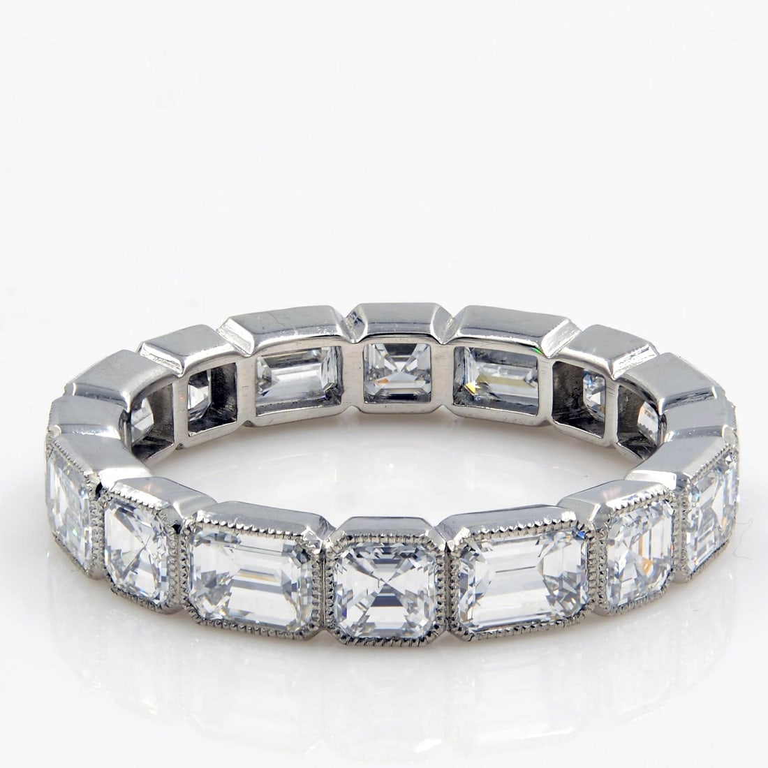 Rachel Koen 3.50cttw Diamond Eternity Band Platinum IGI Certified: Rachel Koen 3.50cttw Diamond Eternity Band Platinum IGI Certified This stunning Rachel Koen eternity band showcases a dazzling array of emerald-cut and asscher-cut diamonds, elegantly set in a lustrou
