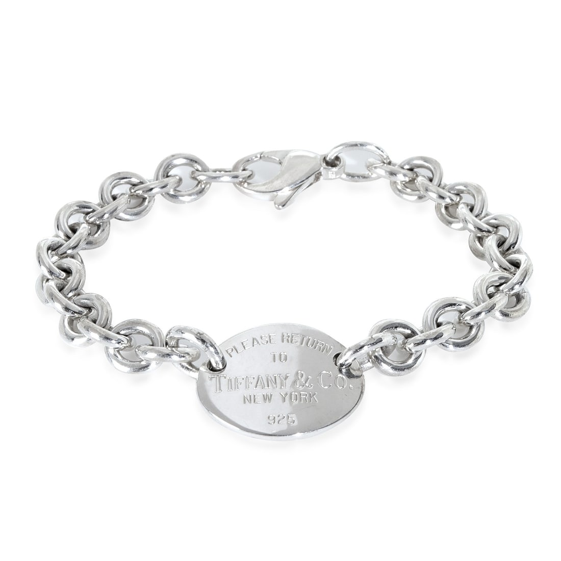 Return To Tiffany Sterling Bracelet in 7.25 Inch Length with Pouch: Return To Tiffany Sterling Bracelet in 7.25 Inch Length with Pouch This Tiffany & Co. Return To Tiffany bracelet is crafted from sterling silver with a lobster claw clasp. It features a classic bracel