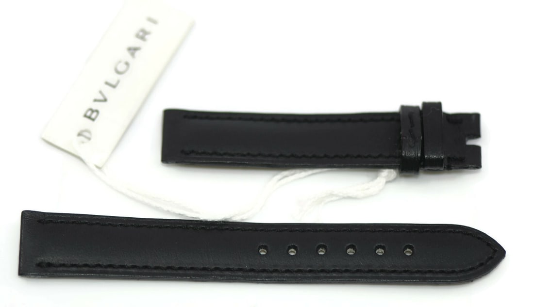 Bvlgari Authentic Black Leather Wristwatch Band 14mm: Bvlgari Authentic Black Leather Wristwatch Band 14mm Enhance your timepiece with this authentic Bulgari black leather wristwatch band. Crafted from high-quality leather, this band features a sleek bla