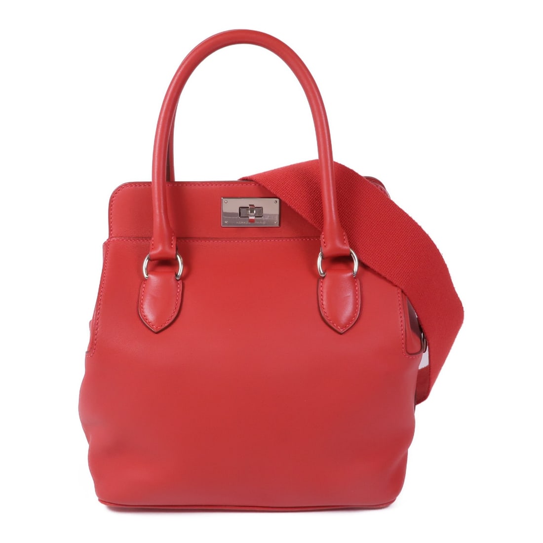 HERMES ToolBox 20 2way Shoulder Bag Red Veau Swift Leather: HERMES ToolBox 20 2way Shoulder Bag Red Veau Swift Leather This exquisite HERMES ToolBox 20 2way Shoulder Bag is crafted from high-quality Veau Swift leather, featuring a striking vermillion/red exter