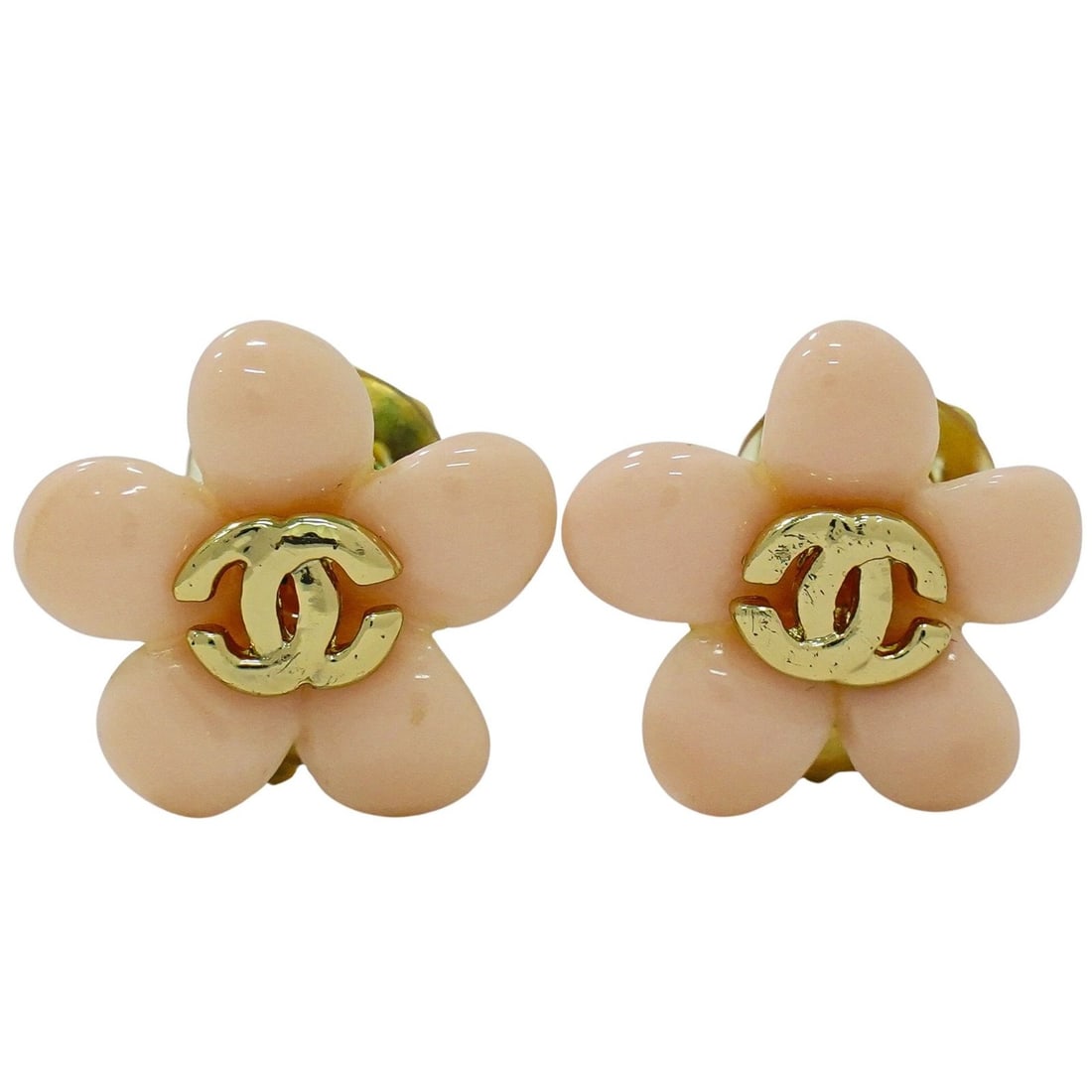 Vintage Pink Flower Clip-On Earrings from Chanel: Vintage Pink Flower Clip-On Earrings from Chanel These pre-owned Chanel Vintage CC Flower clip-on earrings feature a pink design and are crafted with gold plating. They show some stains and signs of r