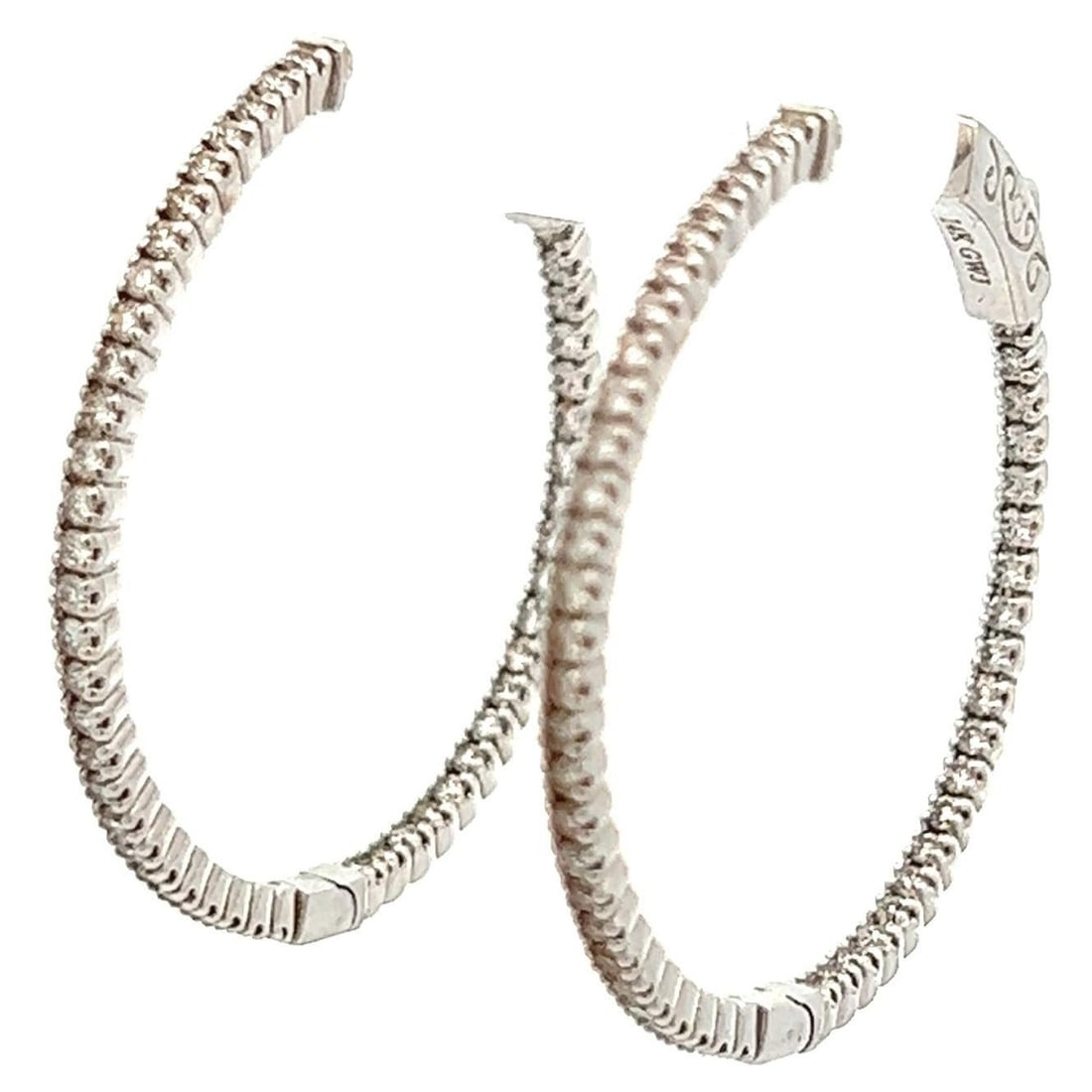 14k White Gold 0.92ct Round Diamond Hoop Earrings 96 Stones: 14k White Gold 0.92ct Round Diamond Hoop Earrings 96 Stones Elevate your elegance with these stunning contemporary hoop earrings, featuring 96 round brilliant diamonds totaling 0.92 carats. Set in lux