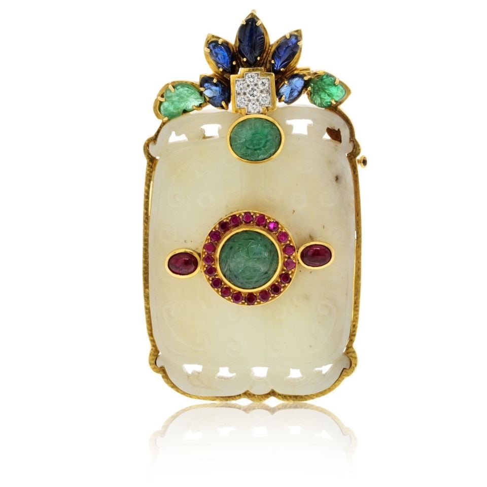 David Webb 18K Yellow Gold Jade Pendant with Emeralds Rubies and Diamonds: David Webb 18K Yellow Gold Jade Pendant with Emeralds Rubies and Diamonds This stunning David Webb pendant is crafted from 18K yellow gold and features a beautifully carved jade centerpiece. The exqui