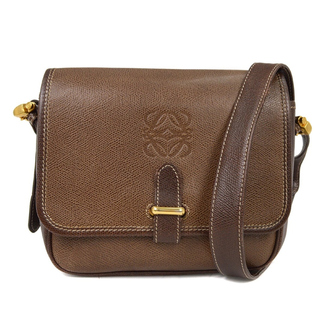 Vintage Loewe Brown Leather Shoulder Bag: Vintage Loewe Brown Leather Shoulder Bag This vintage Loewe shoulder bag features a classic brown exterior and is designed for female use. The bag shows noticeable scuffs and scratches on the outside,