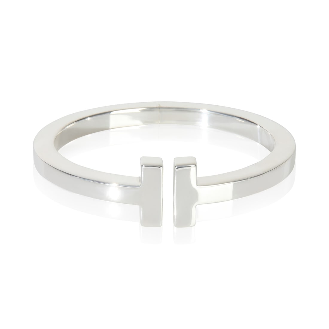 Tiffany T Square Hinged 925 Silver Bracelet 5.75 Inch Germany with Pouch: Tiffany T Square Hinged 925 Silver Bracelet 5.75 Inch Germany with Pouch This Tiffany & Co. T Square Hinged Bracelet is crafted from sterling silver with a 925 purity, offering a modern and sleek look