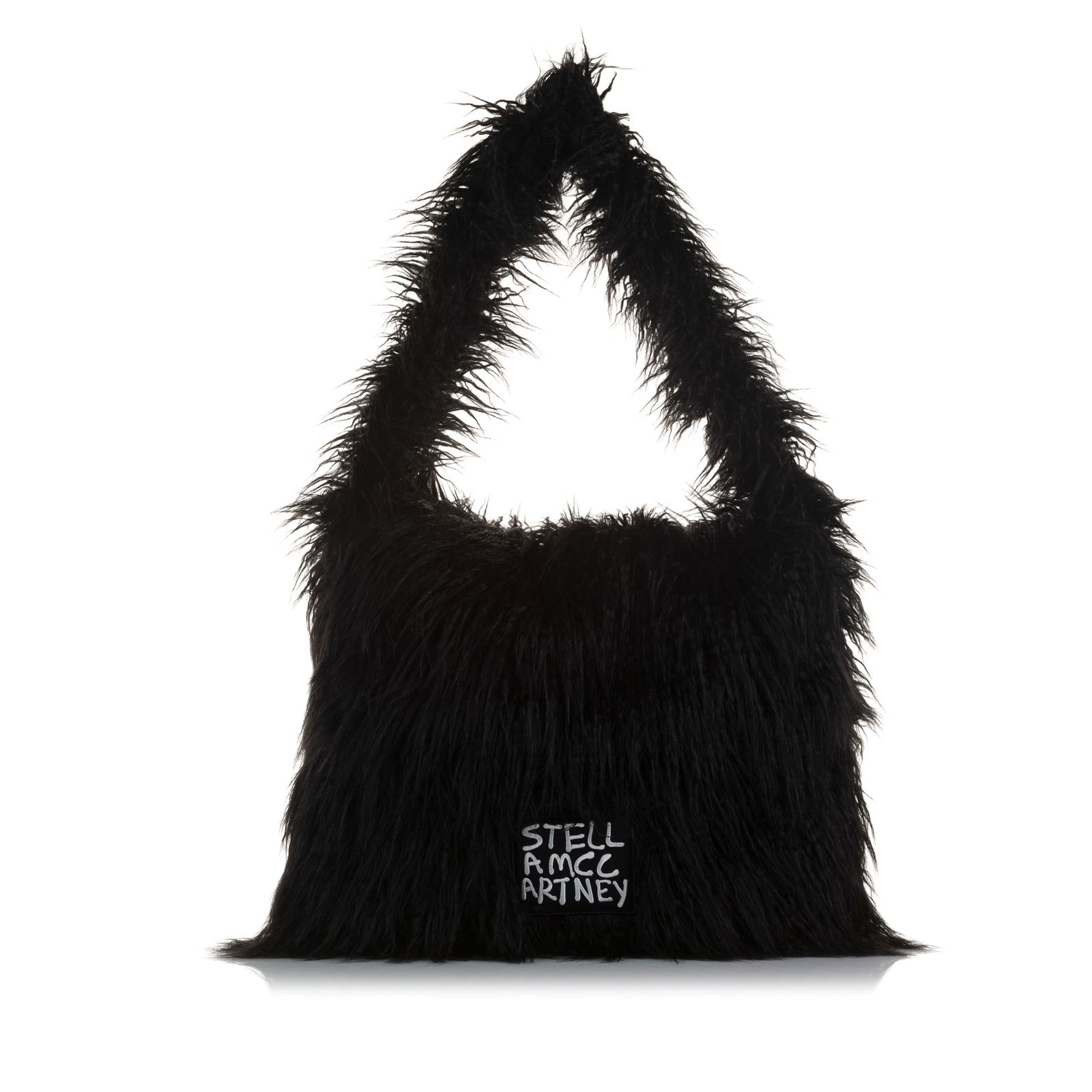 Stella McCartney x Ed Curtis Black Faux Fur Shoulder Bag: Stella McCartney x Ed Curtis Black Faux Fur Shoulder Bag Introducing the Stella McCartney x Ed Curtis Faux Fur Shoulder Bag, an elegant accessory crafted in Italy. This stylish bag features a soft fau