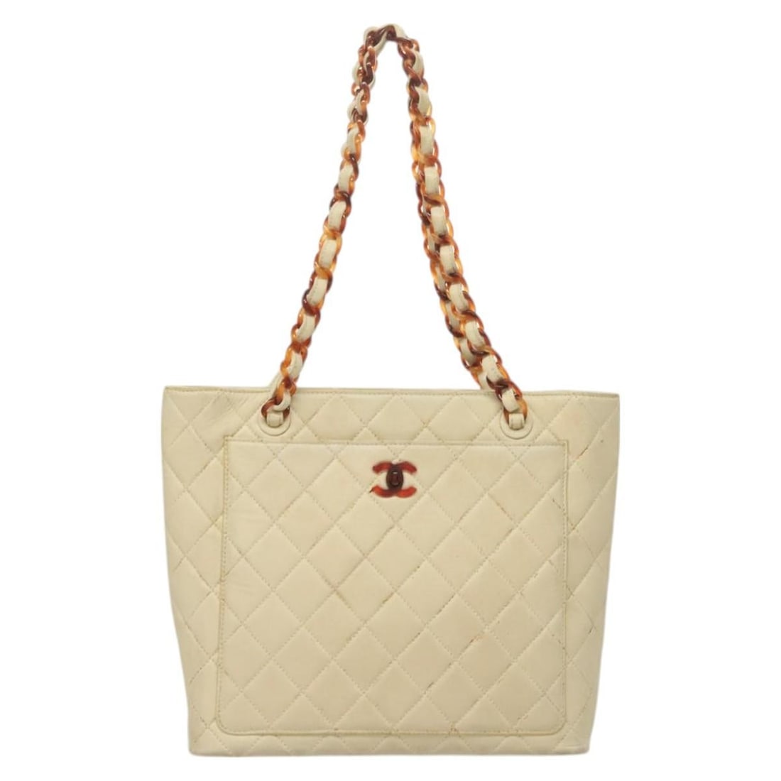 Beige Chanel CC Logo Vintage Tote Bag with Front Pocket: Beige Chanel CC Logo Vintage Tote Bag with Front Pocket This Chanel Vintage CC Front Pocket Tote in beige features a classic tote design with a front pocket and signature CC logo. The exterior shows s
