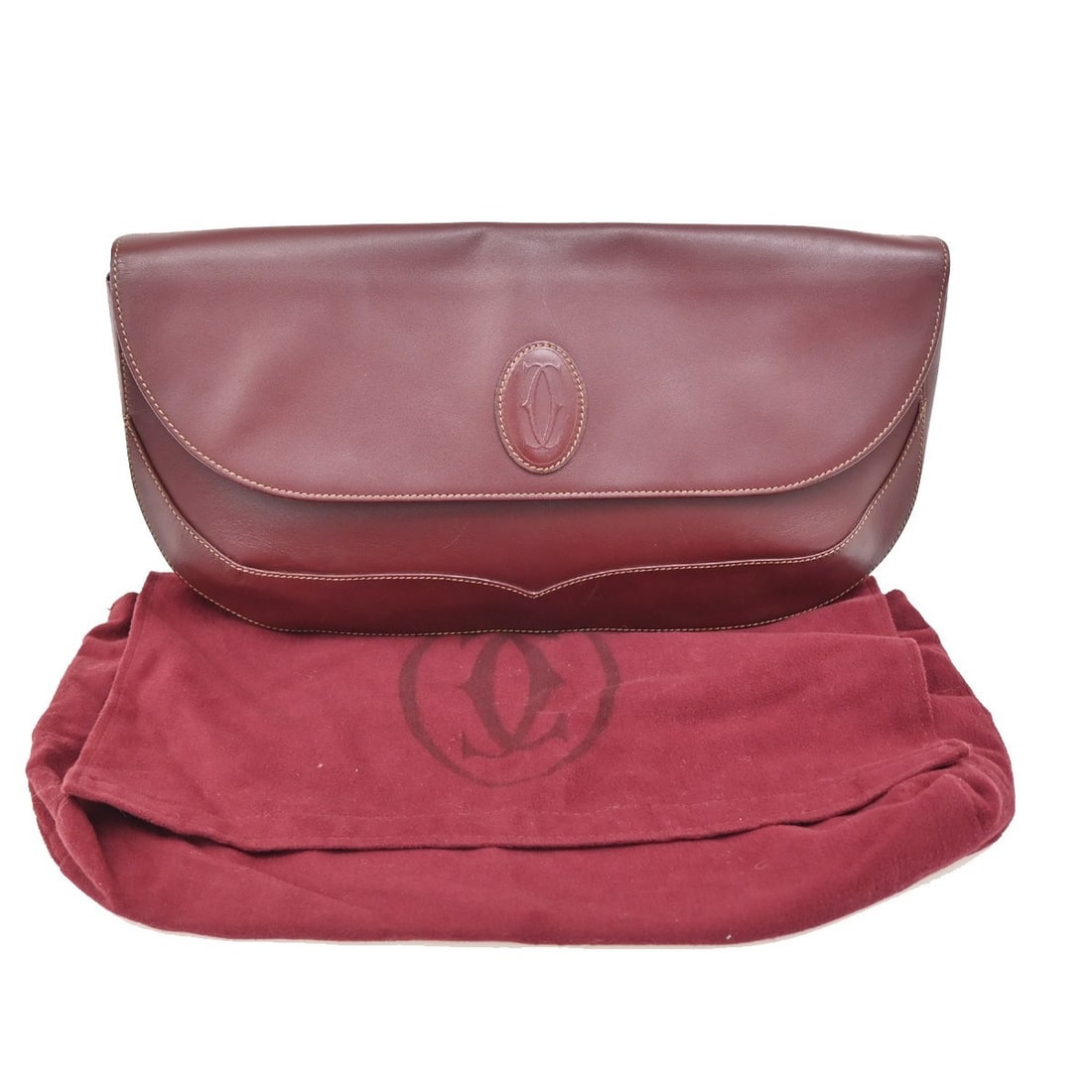 Red Must de Cartier Pre-Owned Clutch Bag: Red Must de Cartier Pre-Owned Clutch Bag This pre-owned Cartier Must de Cartier clutch bag features a red exterior. It is designed for female use and shows noticeable signs of use, including scuffs, d