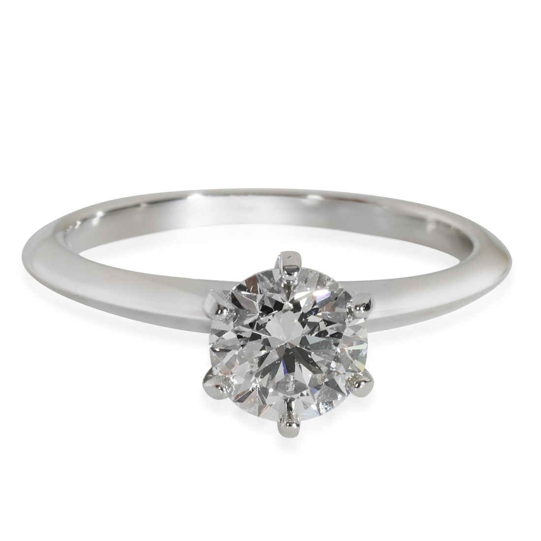 Tiffany & Co. 0.95 ct VS1 Round Brilliant Diamond Engagement Ring in Platinum: Tiffany & Co. 0.95 ct VS1 Round Brilliant Diamond Engagement Ring in Platinum This exquisite Tiffany & Co. engagement ring features a stunning 0.95 ct round brilliant diamond, showcasing exceptional c