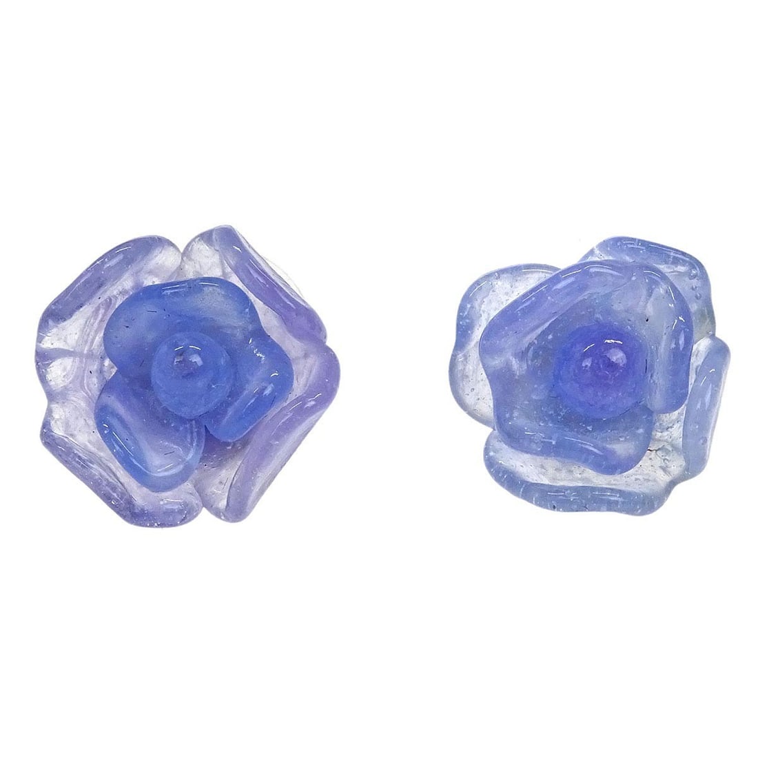 Chanel 01P Silver Camellia Piercing Earrings: Chanel 01P Silver Camellia Piercing Earrings These stunning Chanel Camellia Piercing Earrings are crafted in silver and feature a beautiful purple accent. Designed for pierced ears, they utilize a sec