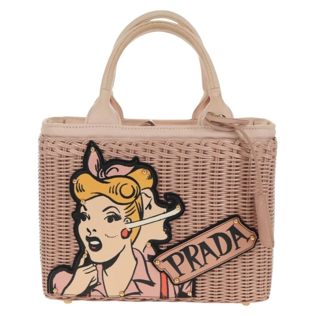 Pink Prada Comic Basket Pre-Owned Handbag: Pink Prada Comic Basket Pre-Owned Handbag This pre-owned Prada Comic Basket Bag in pink is a handbag designed for women. It is in very good condition, showing slight rubbing and stains on the surface