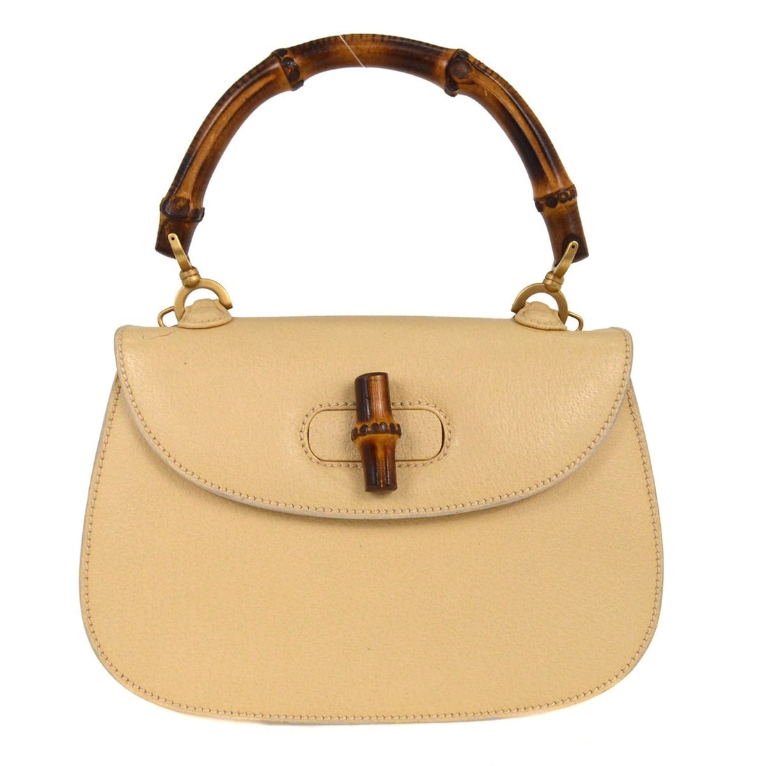 Beige and Brown Gucci Vintage Bamboo Convertible Handle Handbag: Beige and Brown Gucci Vintage Bamboo Convertible Handle Handbag This vintage Gucci convertible bamboo top handle bag features a beige and brown color scheme and a signature bamboo handle. The bag is d