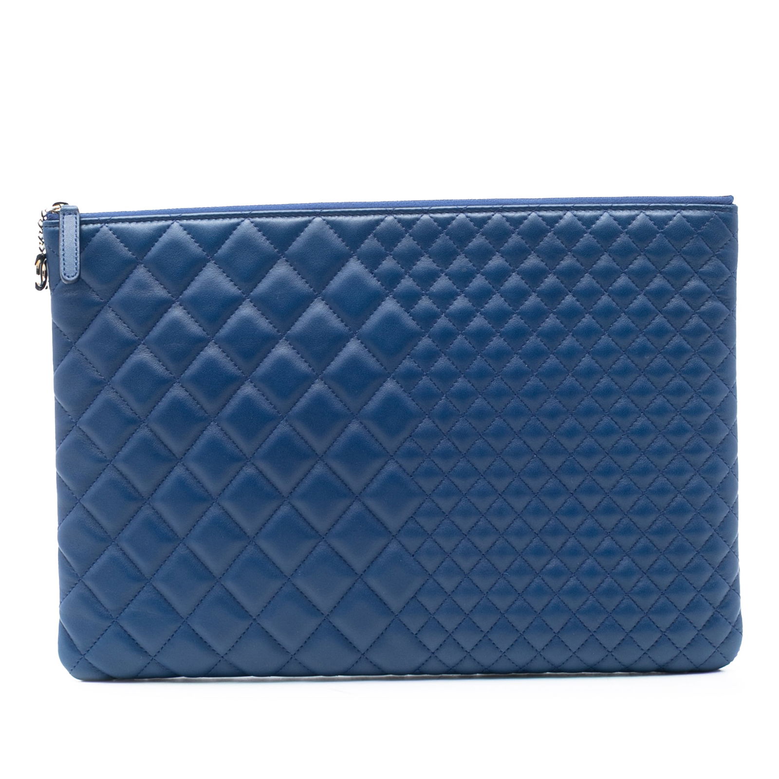 Blue quilted lambskin Chanel O Case clutch with top zip: Blue quilted lambskin Chanel O Case clutch with top zip This Chanel CC Bi Quilted Lambskin O Case Clutch features a blue quilted lambskin leather exterior with a top zip closure. The clutch includes a