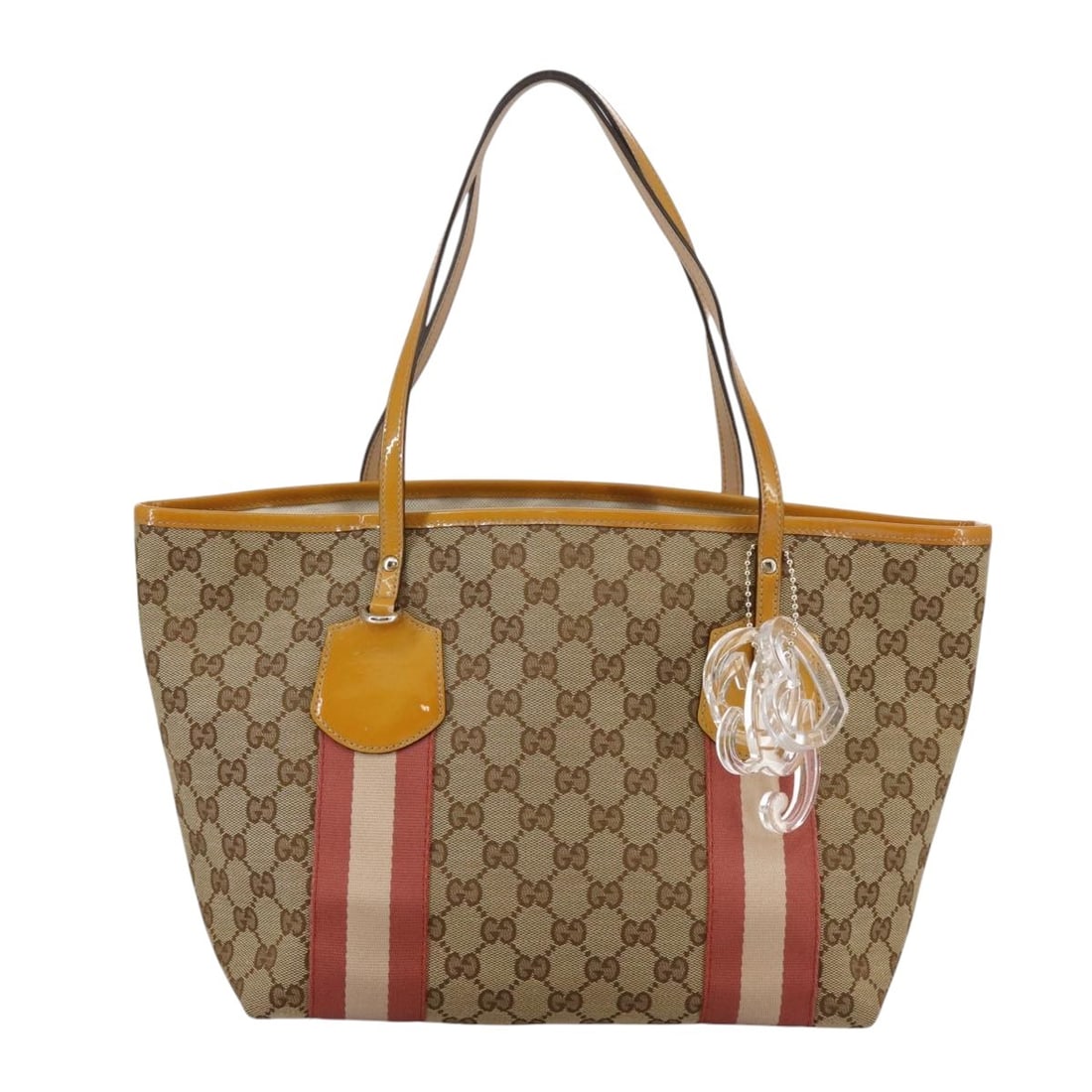 Beige tote from Gucci Sherry Line collection: Beige tote from Gucci Sherry Line collection This pre-owned Gucci Sherry Line tote bag features a beige exterior and is designed for female use. The bag is in good condition with minor signs of wear,