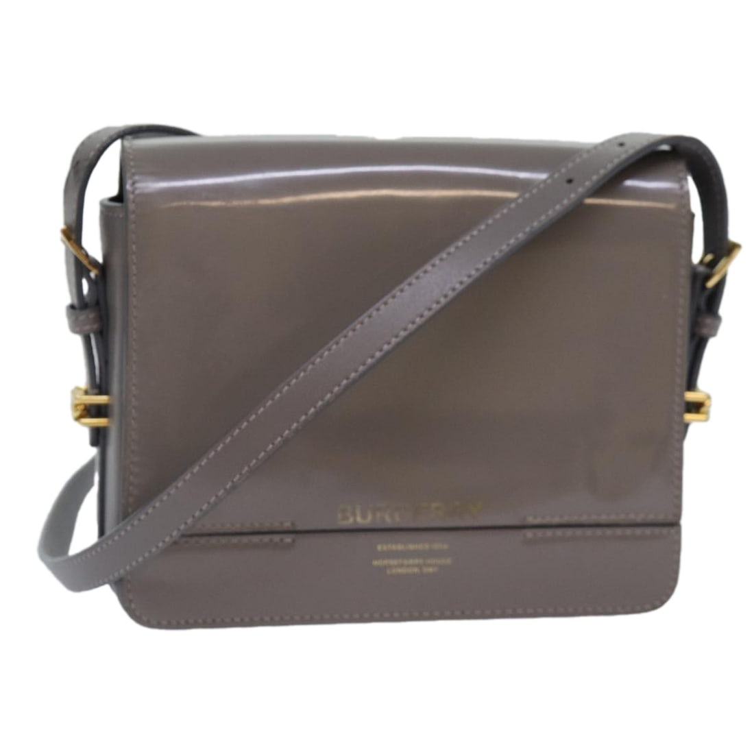 Burberry Gray Gold Patent Leather Shoulder Bag Made in Italy: Burberry Gray Gold Patent Leather Shoulder Bag Made in Italy This stylish Burberry shoulder bag is crafted from high-quality patent leather in a sophisticated gray and gold color combination. Measurin