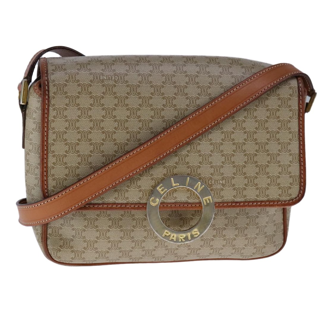 CELINE Beige Macadam Canvas Circle Shoulder Bag Made in Italy: CELINE Beige Macadam Canvas Circle Shoulder Bag Made in Italy The CELINE Macadam Canvas Circle Shoulder Bag is a stylish and practical accessory, crafted in Italy from durable Macadam Canvas in a chic