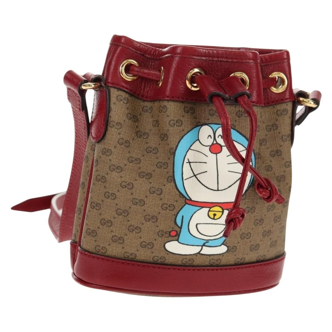 GUCCI Micro GG Supreme Doraemon Mini Bucket Bag Beige PVC Auth 647801: GUCCI Micro GG Supreme Doraemon Mini Bucket Bag Beige PVC Auth 647801 Introducing the GUCCI Micro GG Supreme Doraemon Mini Bucket Bag, a stylish and sophisticated shoulder bag crafted in Italy. This e