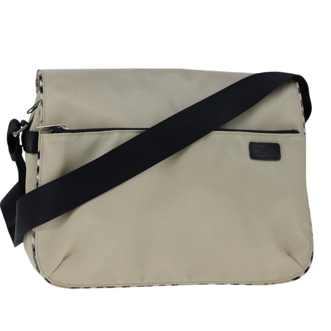 Burberry Nova Check Beige Nylon Shoulder Bag Made in Japan: Burberry Nova Check Beige Nylon Shoulder Bag Made in Japan This Burberry Nova Check Shoulder Bag is a stylish and practical accessory made from durable nylon in a sophisticated beige color. Designed f