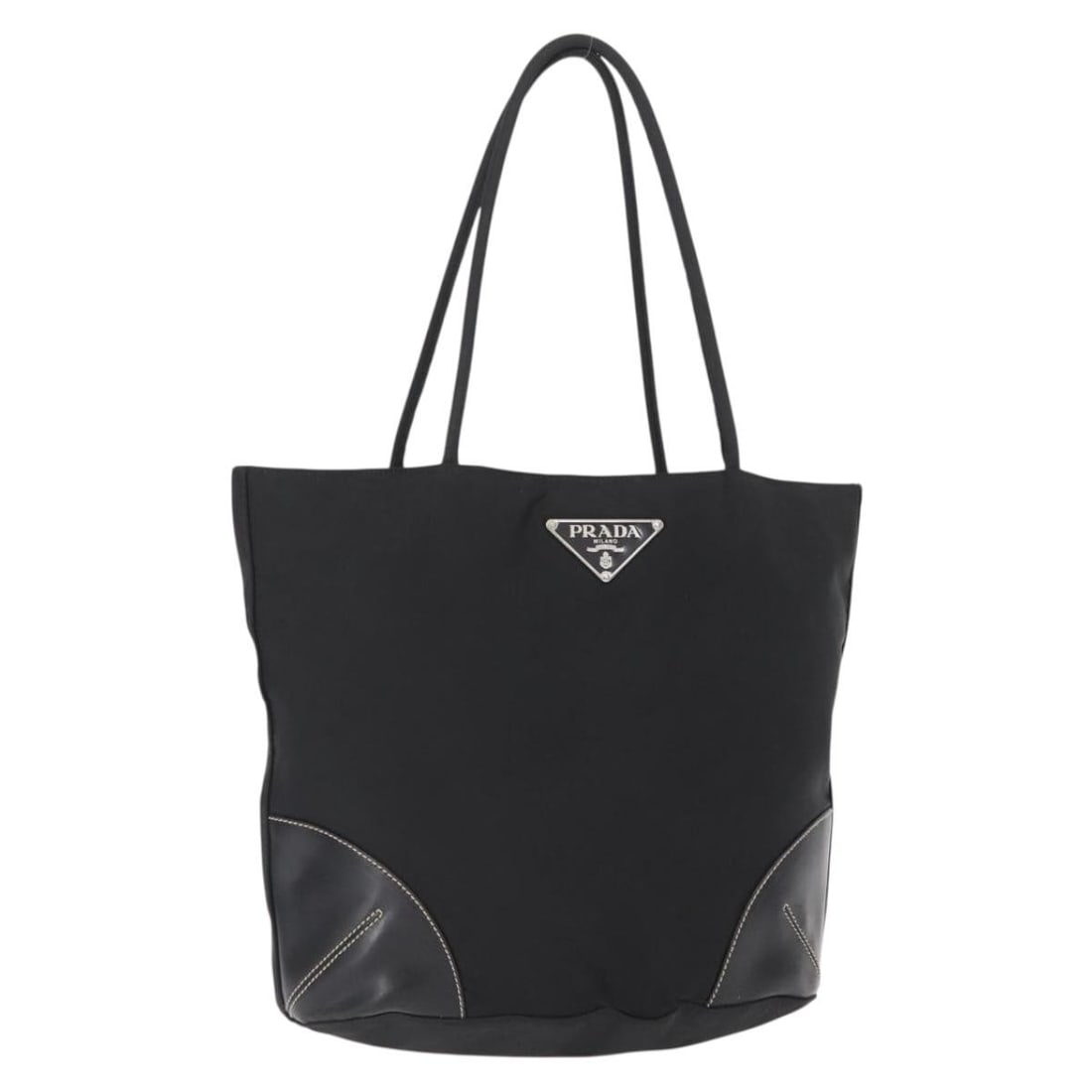 Prada Black Nylon Tote with Silver Accents Made in Italy: Prada Black Nylon Tote with Silver Accents Made in Italy This PRADA tote bag is crafted from black nylon with silver-tone accents. Made in Italy, it features a spacious main compartment and sturdy han