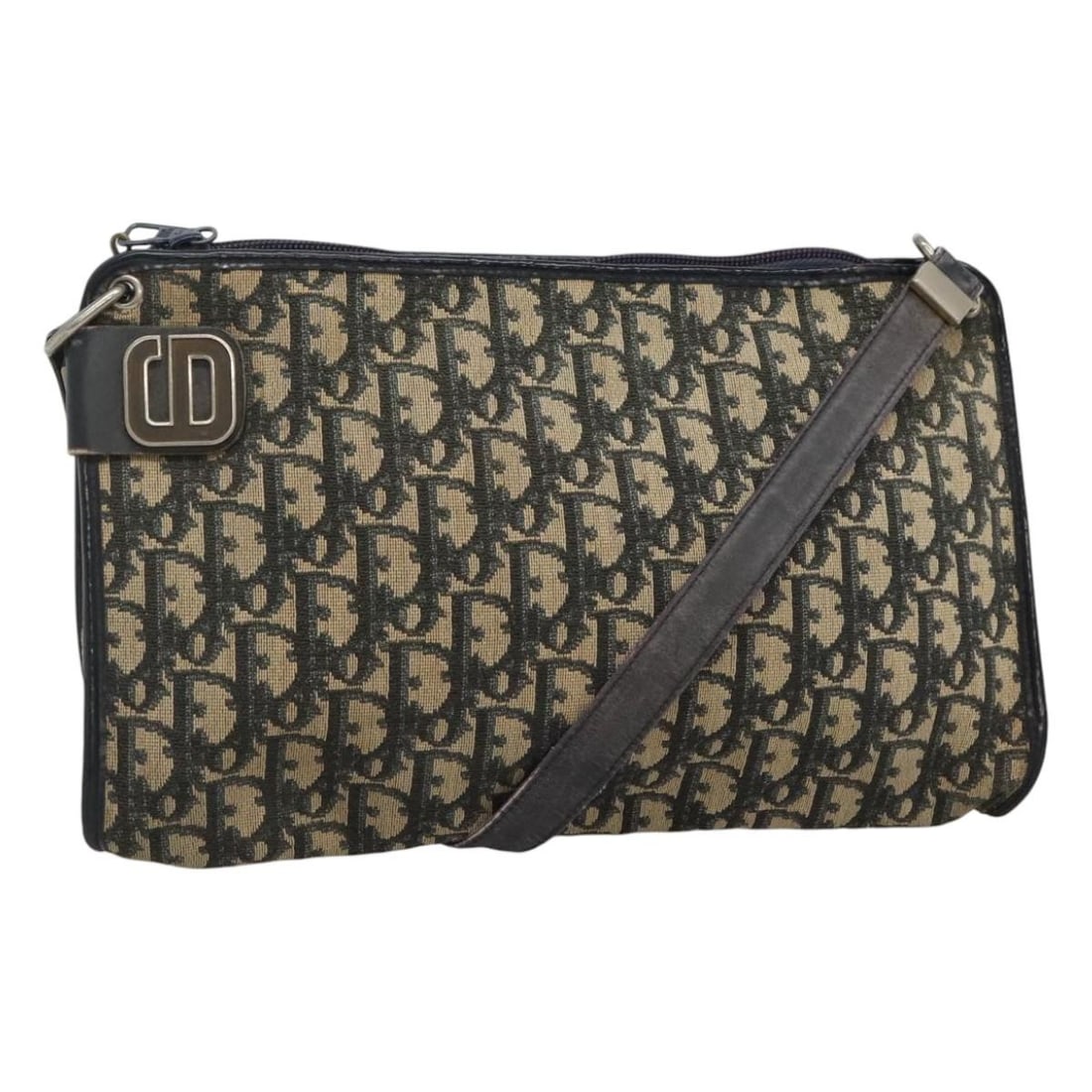 Christian Dior Navy Trotter Canvas Shoulder Bag Authenticated: Christian Dior Navy Trotter Canvas Shoulder Bag Authenticated This authentic Christian Dior Trotter Canvas Shoulder Bag in navy is a stylish accessory, expertly crafted in France. Made from durable ca