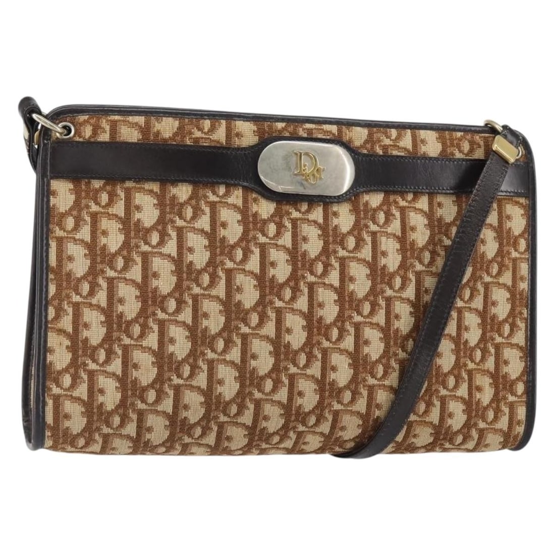 Beige Gold Trotter Canvas Shoulder Bag by Christian Dior France: Beige Gold Trotter Canvas Shoulder Bag by Christian Dior France This Christian Dior Trotter Canvas shoulder bag features a beige and gold exterior with the signature Trotter canvas material. Made in F