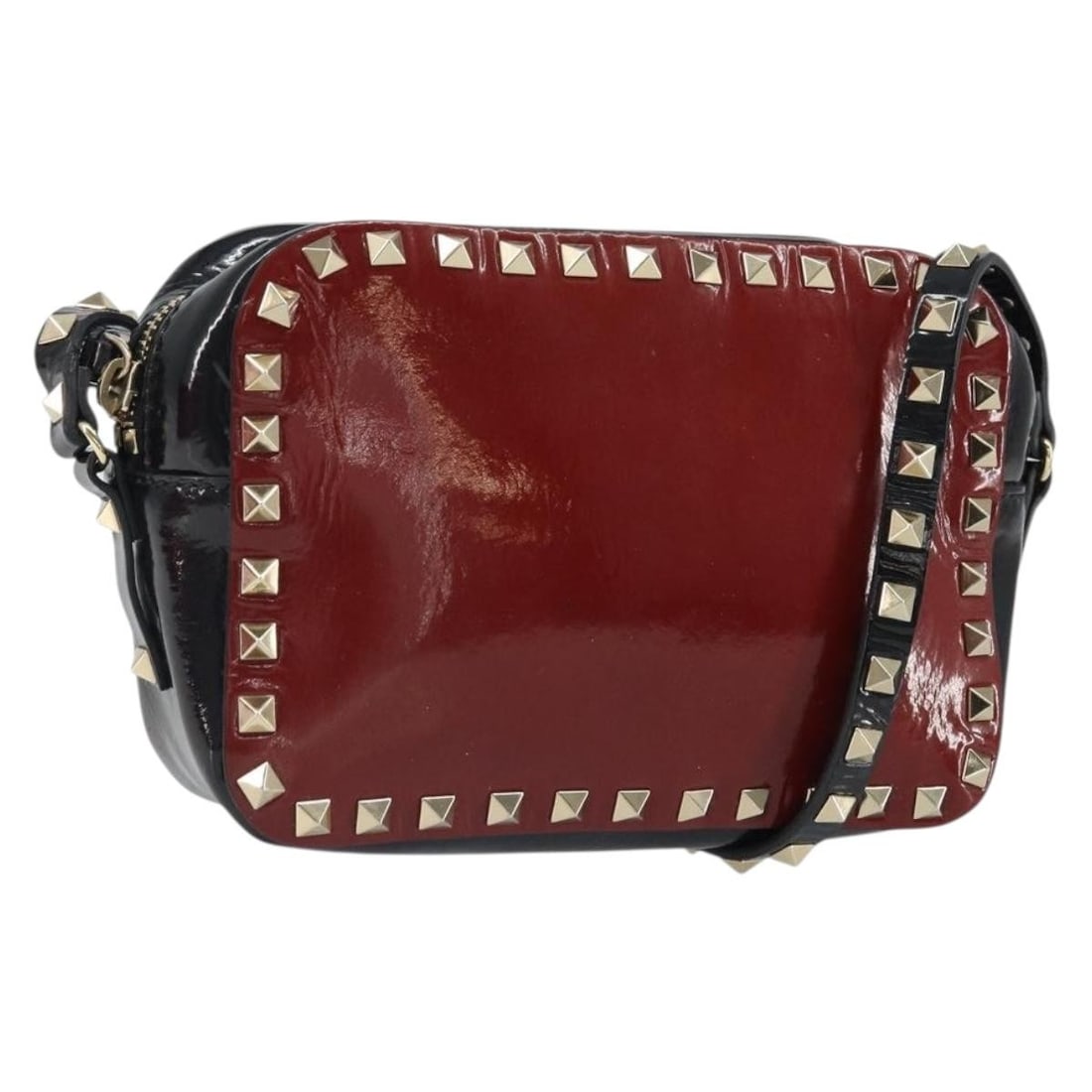 Valentino Red Enamel Rockstud Shoulder Bag with Gold Tone Hardware: Valentino Red Enamel Rockstud Shoulder Bag with Gold Tone Hardware This Valentino Rock Studs shoulder bag features a striking red and gold enamel exterior with signature stud detailing. The bag is cra