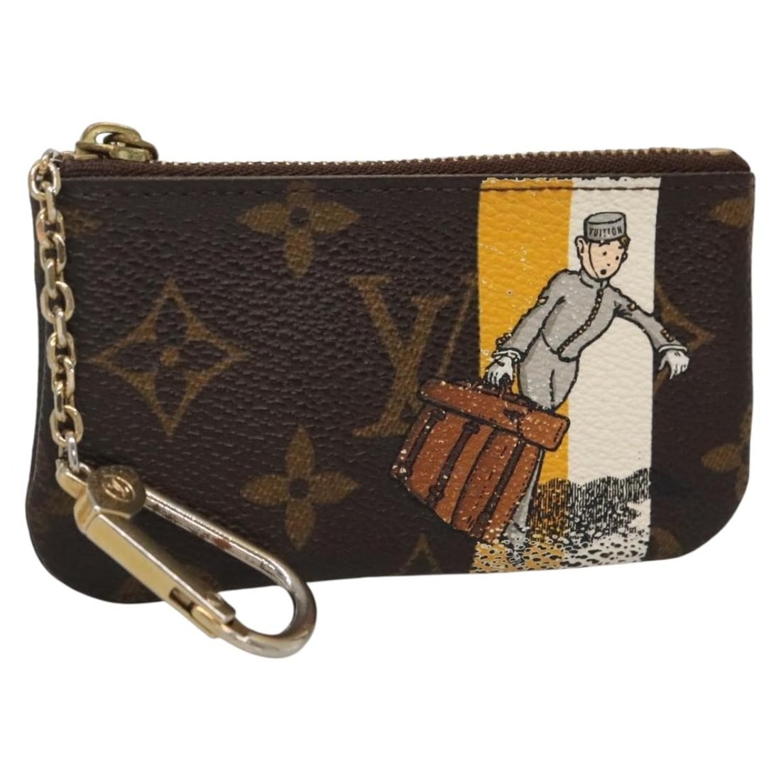 LOUIS VUITTON Monogram Groom Jaune Coin Purse M60033 Auth: LOUIS VUITTON Monogram Groom Jaune Coin Purse M60033 Auth This authentic Louis Vuitton Monogram Groom Pochette Cles Coin Purse in Jaune is a stylish accessory for everyday use. Crafted from durable mo