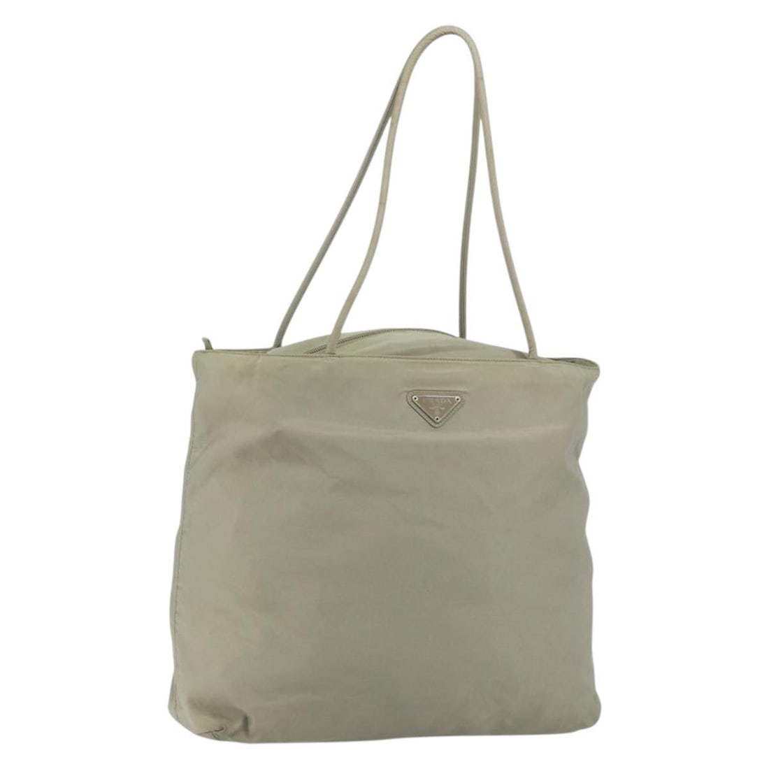 Khaki Nylon PRADA Tote with Silver Accents Made in Italy: Khaki Nylon PRADA Tote with Silver Accents Made in Italy This Prada tote bag features a khaki nylon exterior with silver-tone accents. Made in Italy, it is designed with a spacious interior and practi