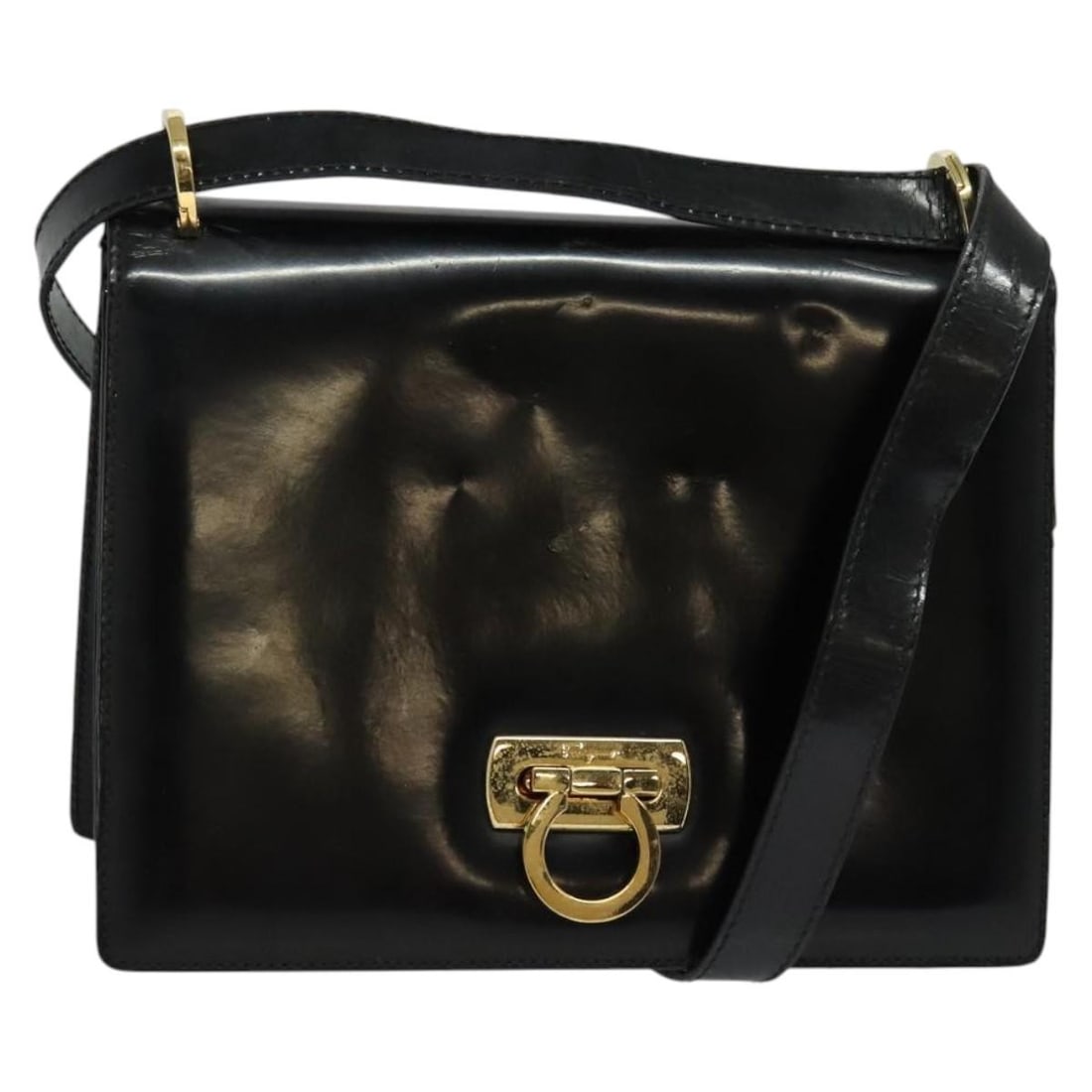 Salvatore Ferragamo Gancini Shoulder Bag Leather Black Gold Italy: Salvatore Ferragamo Gancini Shoulder Bag Leather Black Gold Italy This Salvatore Ferragamo Gancini Shoulder Bag showcases a luxurious blend of black leather with gold accents, making it a stylish addi