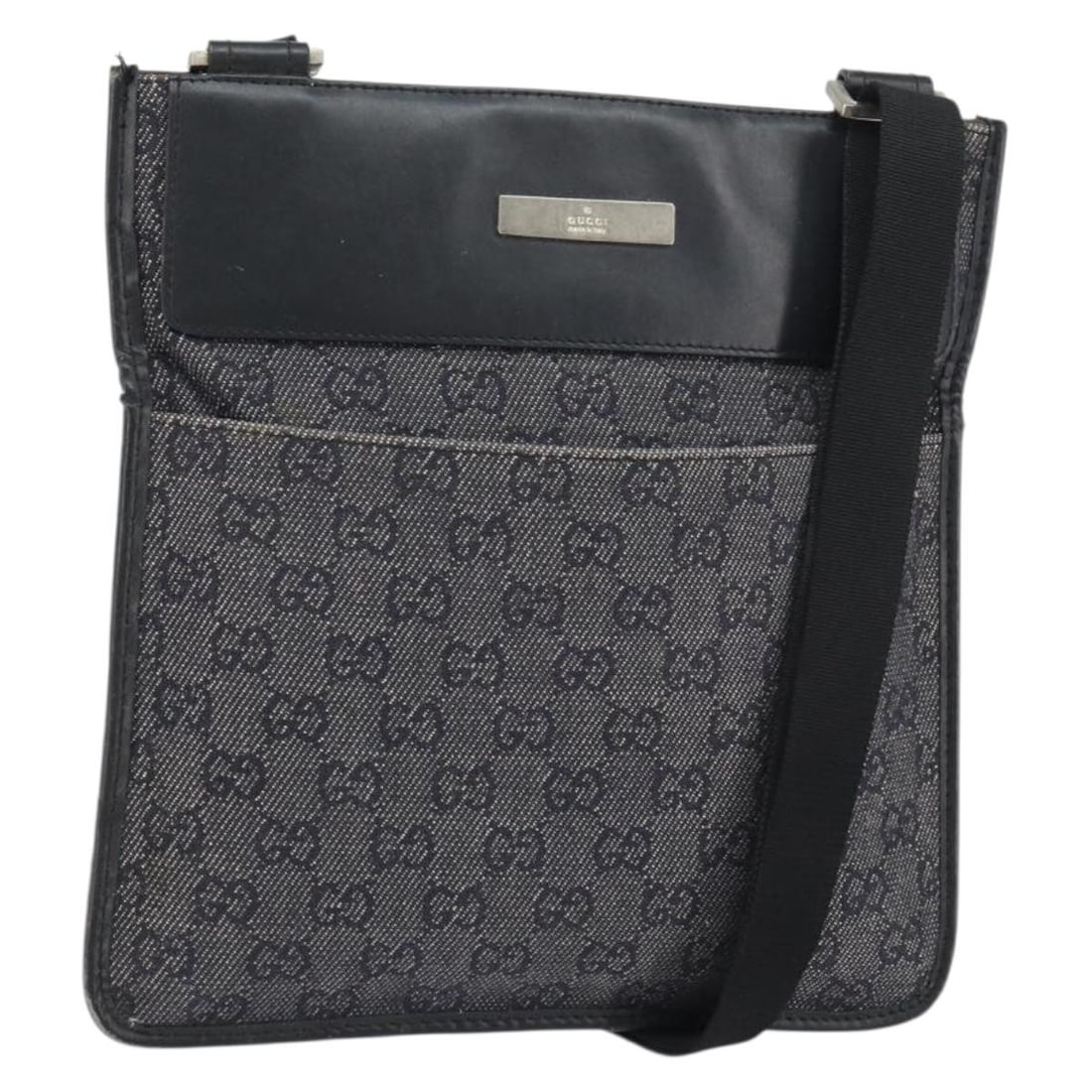 Black GG Canvas Gucci Shoulder Bag with Silver Accents Italy 27639: Black GG Canvas Gucci Shoulder Bag with Silver Accents Italy 27639 This is a Gucci GG Canvas shoulder bag in black and silver, crafted in Italy. The bag features Gucci's signature GG canvas exterior,