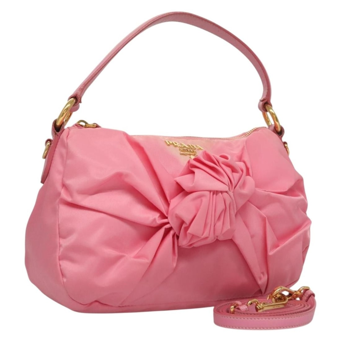 PRADA Pink Gold Nylon Hand Bag 2 Way Italy Auth: PRADA Pink Gold Nylon Hand Bag 2 Way Italy Auth This authentic PRADA hand bag showcases a stylish combination of pink and gold nylon. Designed for versatility, it features a two-way style, making it p
