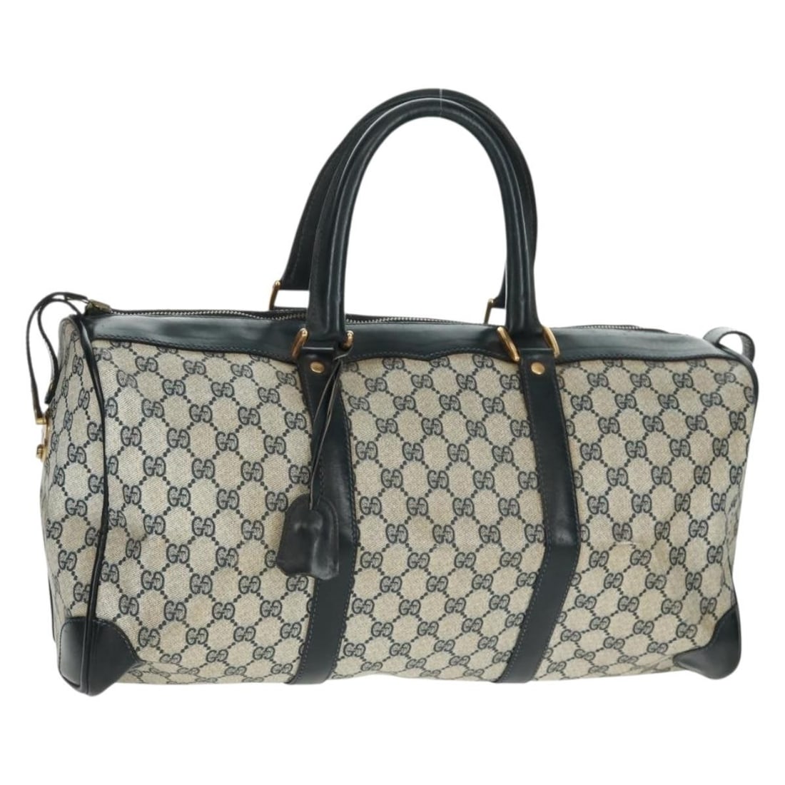 Navy GG Supreme Boston Bag by Gucci in PVC with Gold Details: Navy GG Supreme Boston Bag by Gucci in PVC with Gold Details This is a Gucci GG Supreme Boston Bag crafted from navy and gold PVC leather with GG canvas detailing. The bag features double handles and