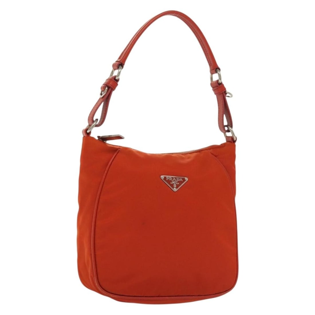 PRADA Orange Silver Nylon Shoulder Bag Auth Italy 139153: PRADA Orange Silver Nylon Shoulder Bag Auth Italy 139153 This stylish PRADA shoulder bag features a vibrant orange nylon exterior complemented by silver accents. Designed for functionality and eleganc