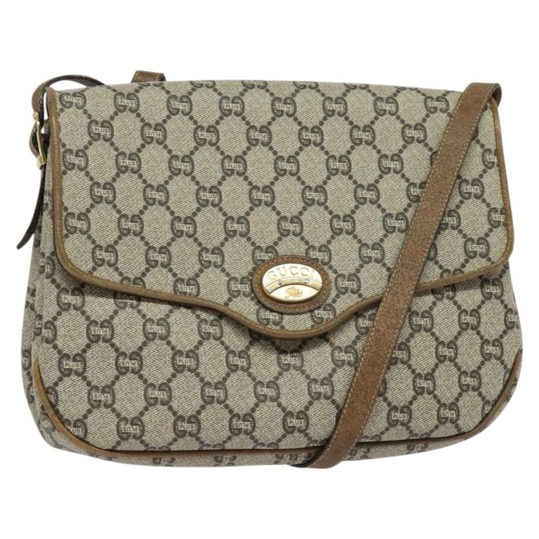 GUCCI GG Plus Supreme Beige Gold PVC Shoulder Bag Made in Italy: GUCCI GG Plus Supreme Beige Gold PVC Shoulder Bag Made in Italy This GUCCI GG Plus Supreme Shoulder Bag is a stylish accessory crafted from durable PVC leather in a chic beige and gold color combinati