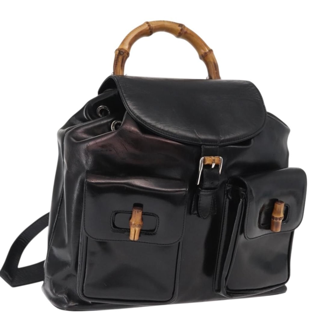 Gucci Black Enamel Bamboo Backpack with Silver Accents 003 2058 0016: Gucci Black Enamel Bamboo Backpack with Silver Accents 003 2058 0016 This GUCCI Bamboo Backpack features a black and silver enamel exterior with silver-tone hardware. The backpack is crafted in Italy