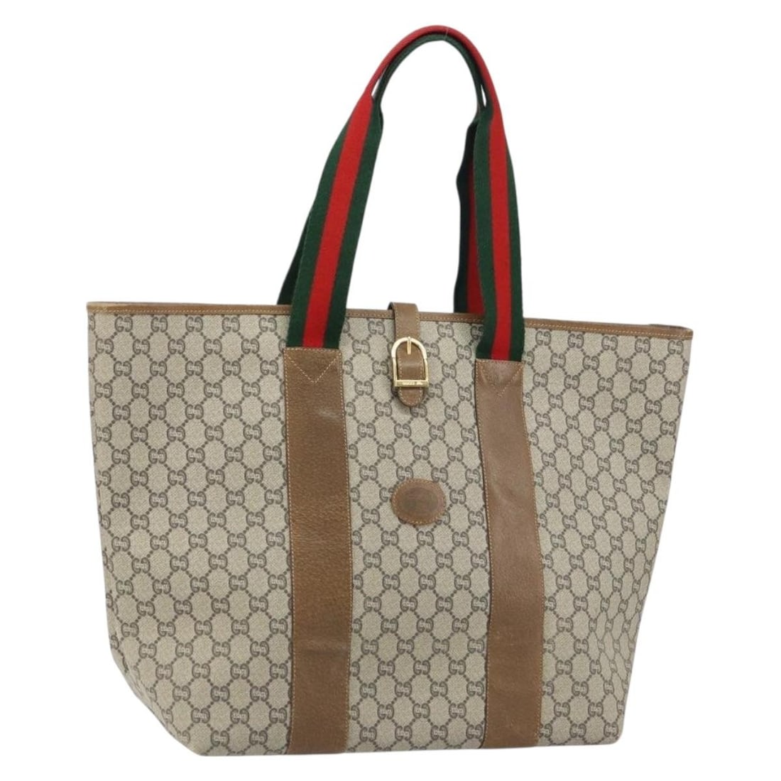Beige GG Supreme PVC Sherry Line Tote by Gucci: Beige GG Supreme PVC Sherry Line Tote by Gucci This is a Gucci GG Plus Supreme Web Sherry Line tote bag crafted from beige and gold PVC leather with GG canvas accents. Made in Italy, the bag features