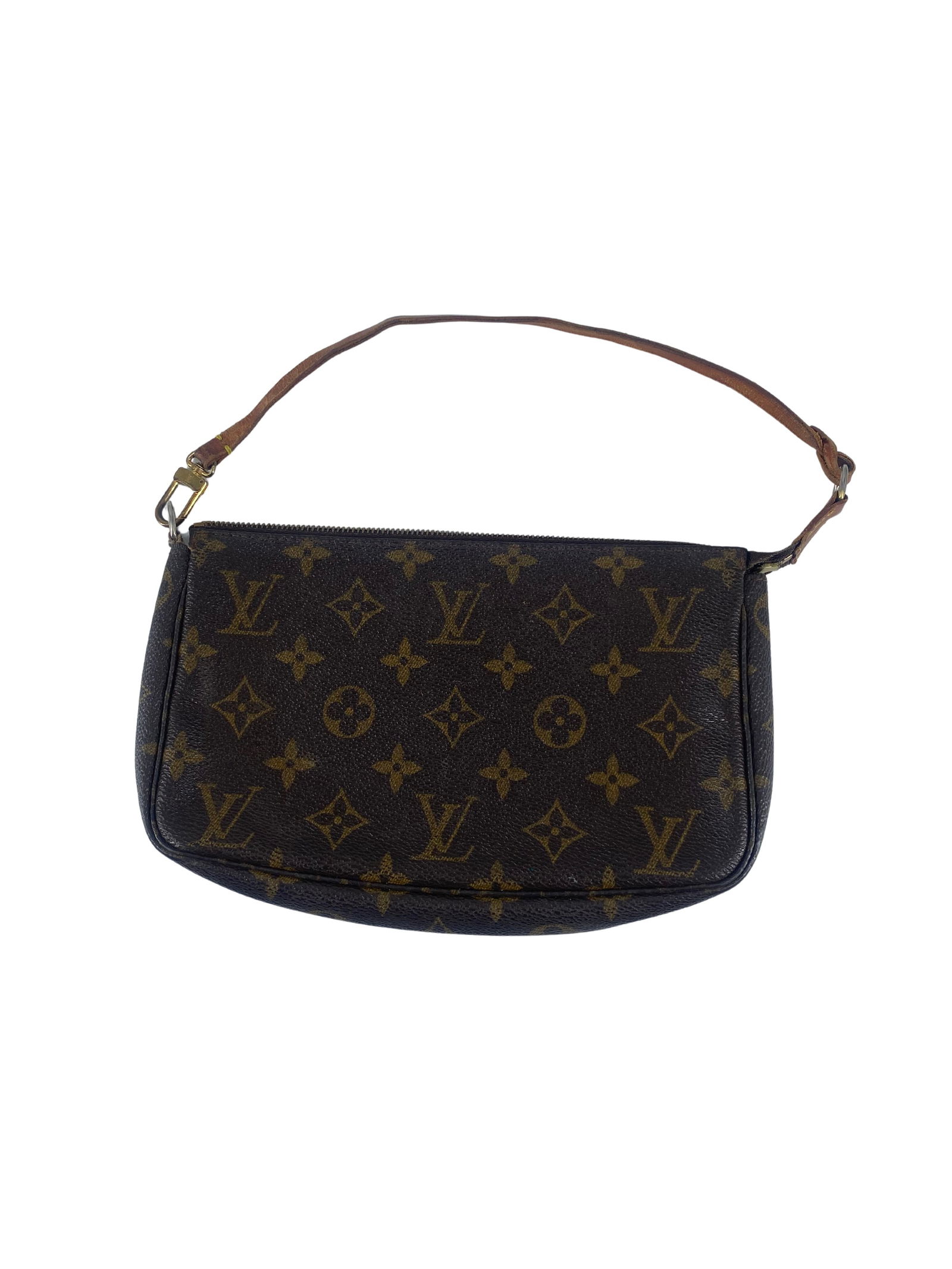 Pochette Accessoire bag in brown by Louis Vuitton: Pochette Accessoire bag in brown by Louis Vuitton This pre-owned Louis Vuitton Pochette Accessoires bag is in fair condition with noticeable signs of use. The exterior shows fading, and the handle has