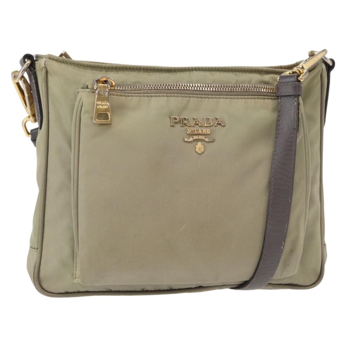 PRADA Beige Gold Nylon Shoulder Bag Italy Auth SW1841: PRADA Beige Gold Nylon Shoulder Bag Italy Auth SW1841 This PRADA Shoulder Bag combines luxurious design with practical functionality. Crafted in Italy, the exterior features durable nylon in a chic be