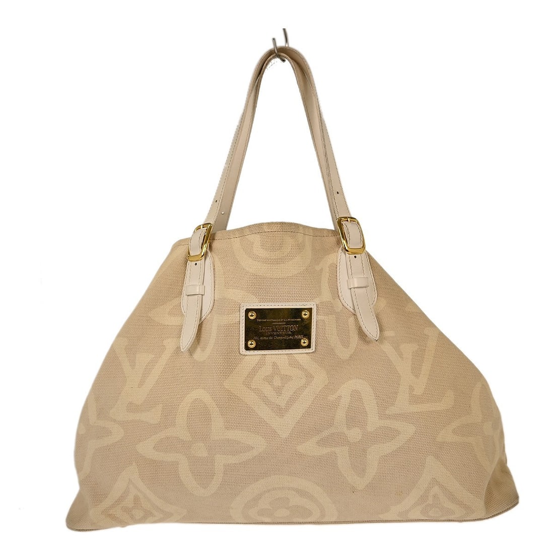 Louis Vuitton Tahitienne GM Beige Canvas Shoulder Tote Bag: Louis Vuitton Tahitienne GM Beige Canvas Shoulder Tote Bag Introducing the Louis Vuitton Tahitienne GM Tote Bag, a perfect blend of style and functionality. This vintage shoulder bag features a spacio