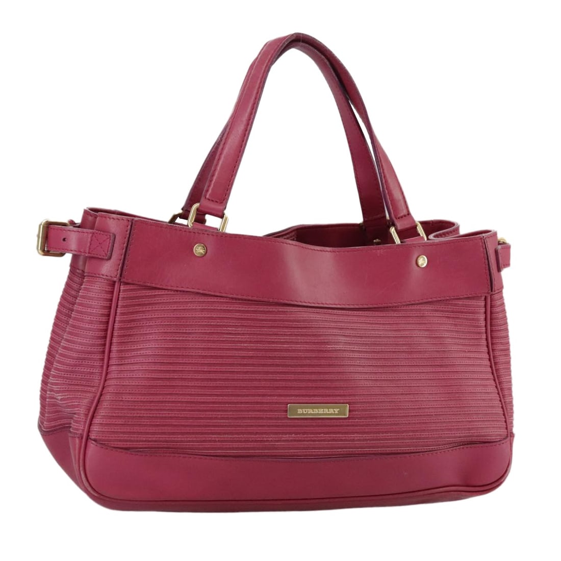 BURBERRY Blue Label Pink Gold Leather Hand Bag Made in Italy: BURBERRY Blue Label Pink Gold Leather Hand Bag Made in Italy Introducing the BURBERRY Blue Label Hand Bag, a stylish accessory crafted from high-quality leather. This eye-catching handbag features a v