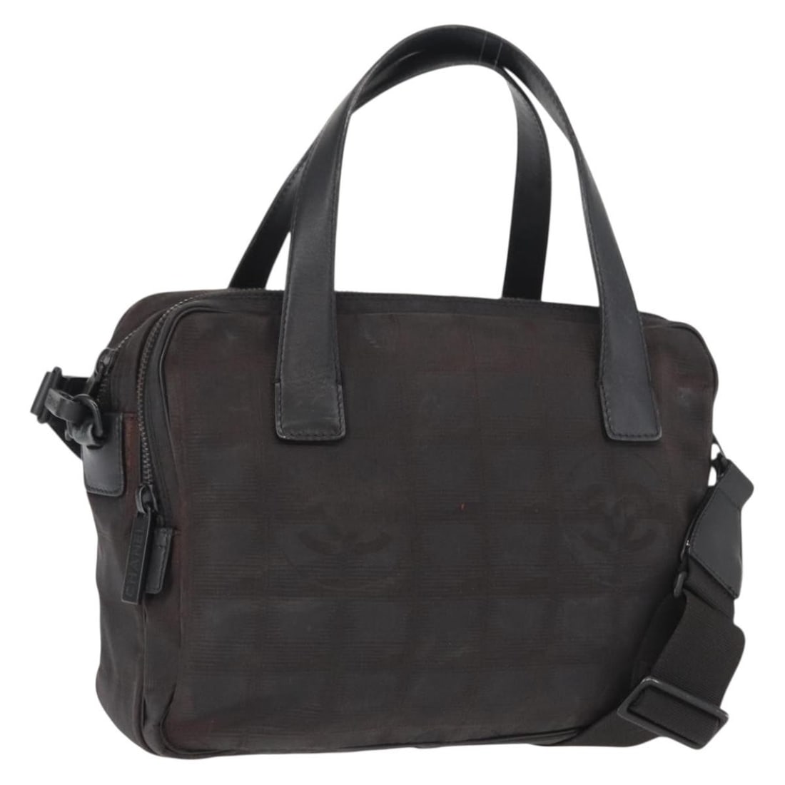 Chanel Black Nylon 2way Handbag with Shoulder Strap New Travel Line: Chanel Black Nylon 2way Handbag with Shoulder Strap New Travel Line This CHANEL Travel Line 2-way handbag features black nylon construction and includes both a top handle and a detachable shoulder str