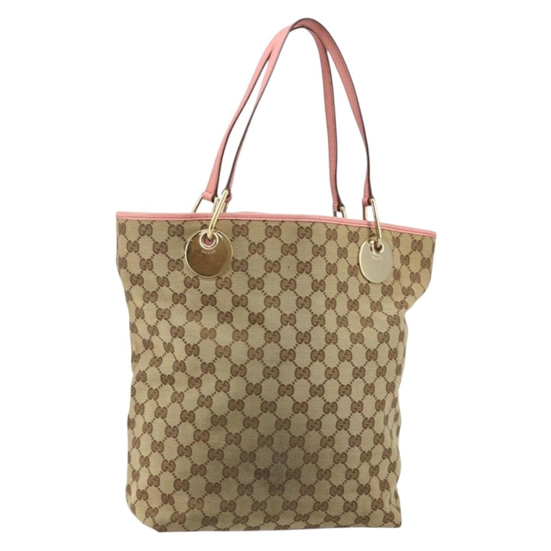 Authentic GUCCI GG Canvas Tote Bag Beige Gold 120836 Made in Italy: Authentic GUCCI GG Canvas Tote Bag Beige Gold 120836 Made in Italy Introducing the GUCCI GG Canvas Tote Bag, a stylish and functional accessory crafted in Italy. This tote features a chic beige and go