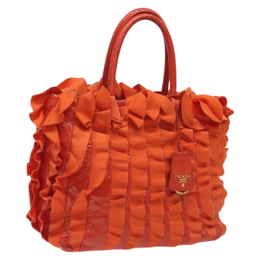 PRADA Orange Gold Nylon Hand Bag Auth 123099 Italy: PRADA Orange Gold Nylon Hand Bag Auth 123099 Italy This authentic PRADA hand bag features a stylish blend of orange and gold in its exterior design. Made from durable nylon, this bag is both practical