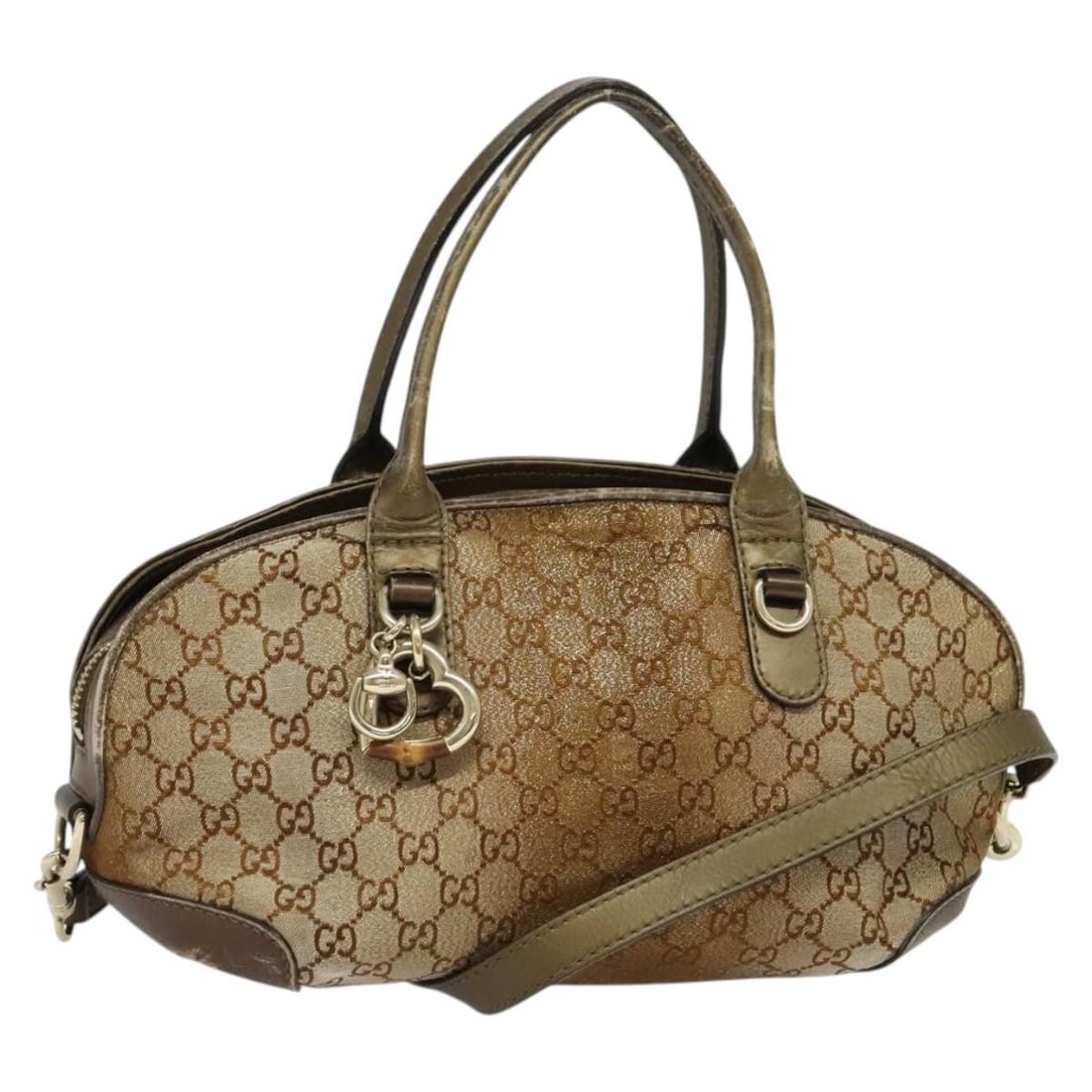 GUCCI Heart Bit GG Canvas Hand Bag Brown Gold 269955 Authentic Italy: GUCCI Heart Bit GG Canvas Hand Bag Brown Gold 269955 Authentic Italy This authentic GUCCI Heart Bit GG Canvas Hand Bag is a stylish and functional accessory, crafted from durable GG Canvas in a rich b